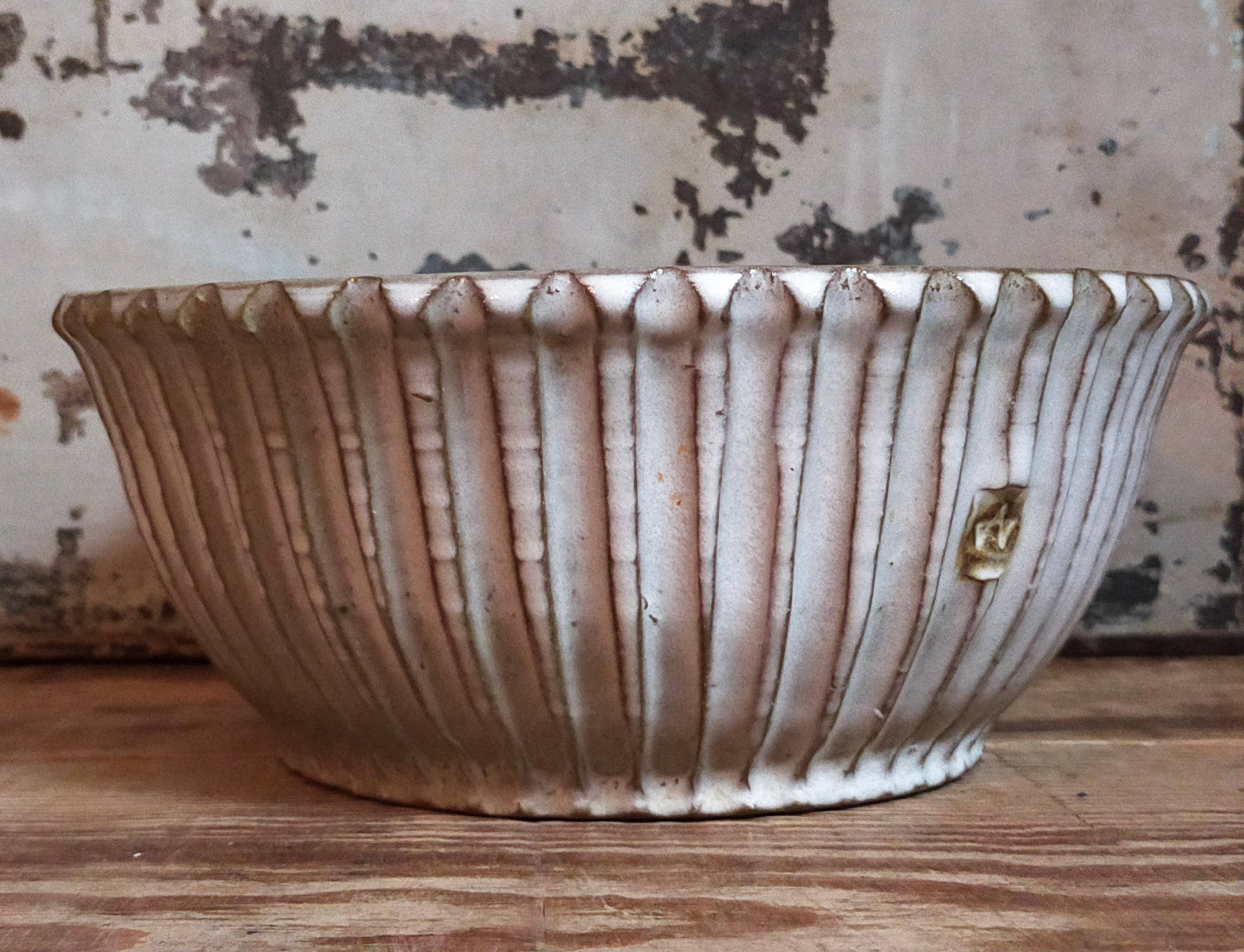 Vintage fluted enameled earthenware potter's salad bowl