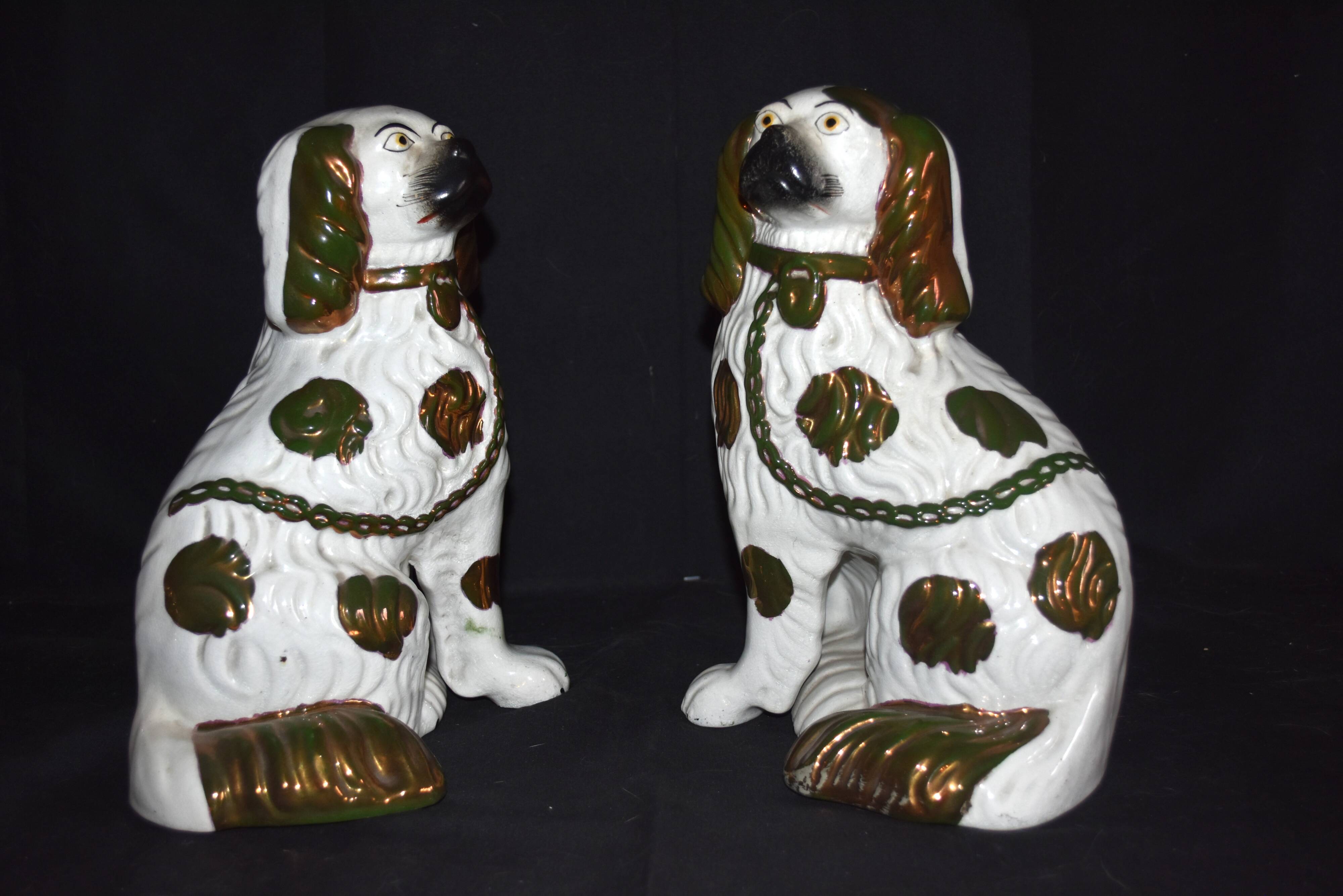 Pair of earthenware dogs (cavalier king charles)
