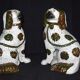 Pair of earthenware dogs (cavalier king charles)