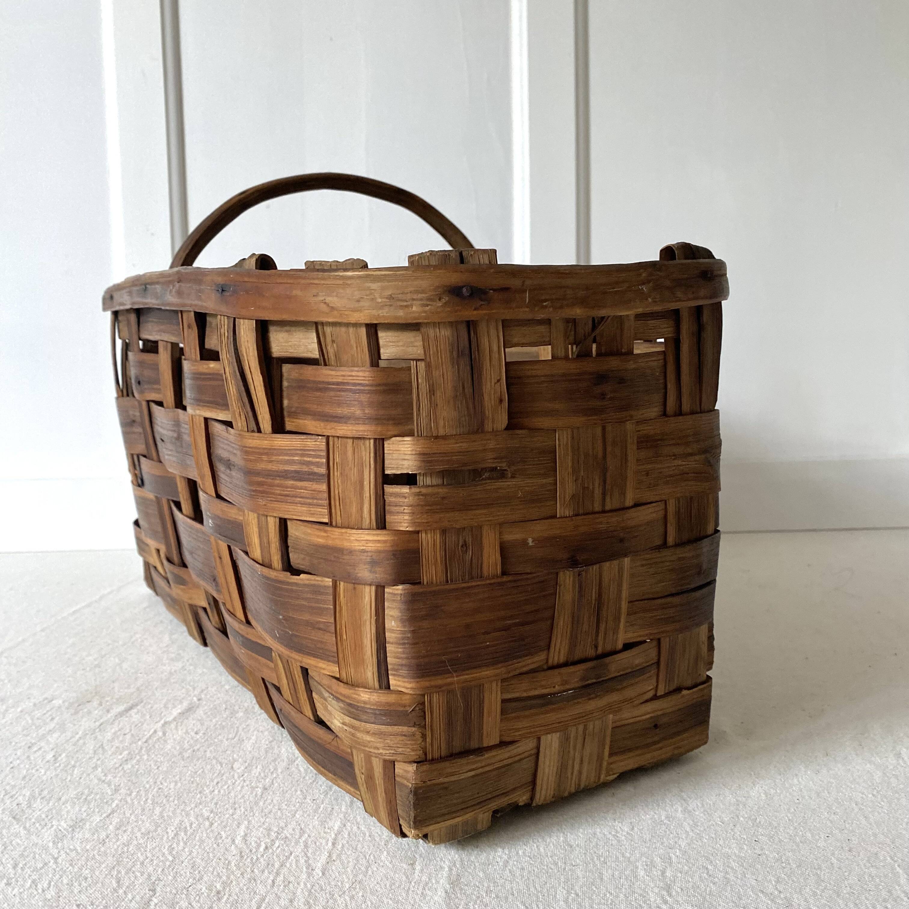 Old basket in woven chestnut wood