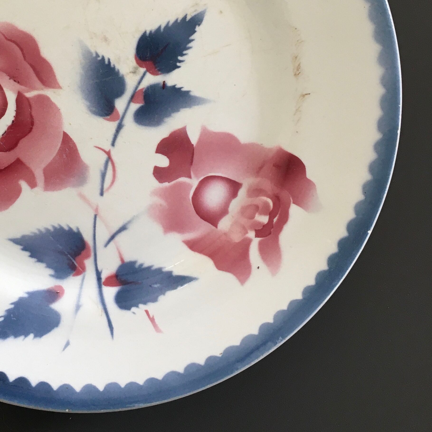 Antique plate decorated with roses