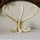 Wall-mounted parrot coat rack