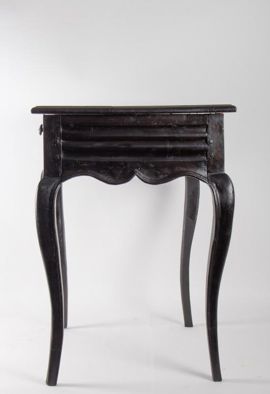 Office table from the early 19th century Louis XV style in blackened wood