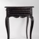 Office table from the early 19th century Louis XV style in blackened wood