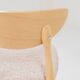 Set of 6 soft pink fabric dining chairs, Scandinavian design, natural wood.