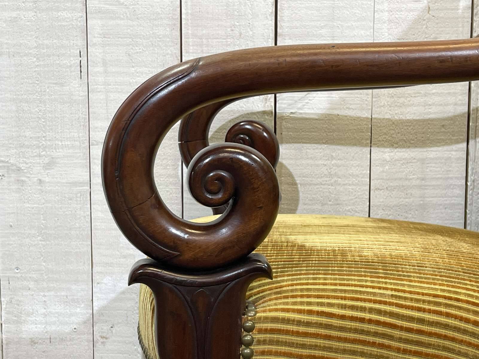 Pair of 19th century mahogany armchairs with crossbars