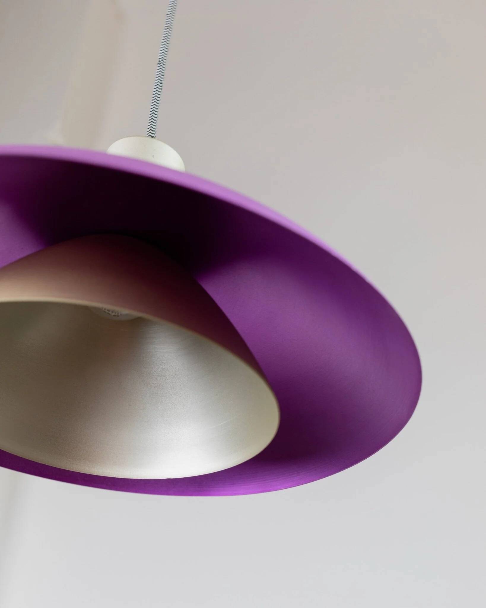 Vintage metal ceiling suspension – postmodern Memphis style from the 1980s, purple, green, silver, striped cable, Pop Art interior, retro light fixture.