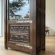 Antique oak display cabinet, solid, in the style of Spanish Renaissance, with sculpture and wrought iron.