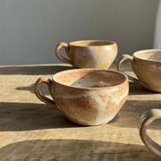 11 tasses à café vintage en grès mat brut
