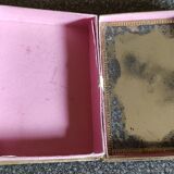 Old rectangular box has fixed under glass