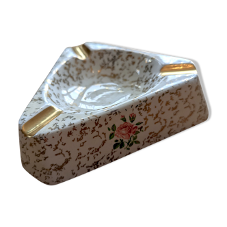 Golden and white flowery ashtray
