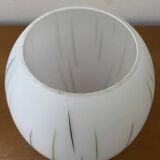 White opaline tulip with dark green and gray streaks. Oblong shape.