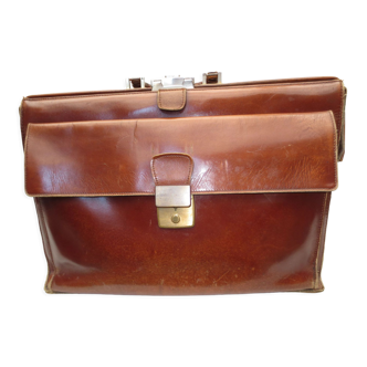 Old doctor's briefcase in tawny leather