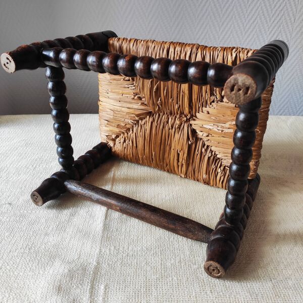Repose-pieds ancien en bois tourné bobine et paille