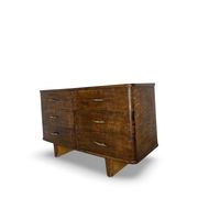 A vintage Italian chest of drawers, made of veneered walnut and solid wood,