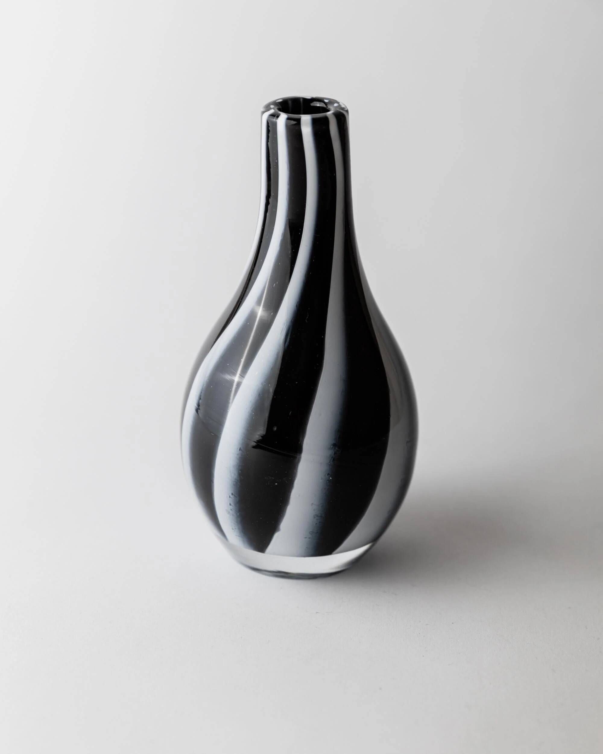 Vintage Murano glass vase from the 1980s, black and white swirl pattern, thick Italian art glass.