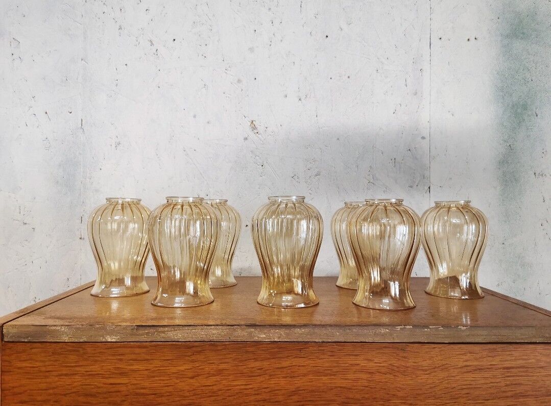 Set of 7 amber glass globes