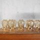 Set of 7 amber glass globes