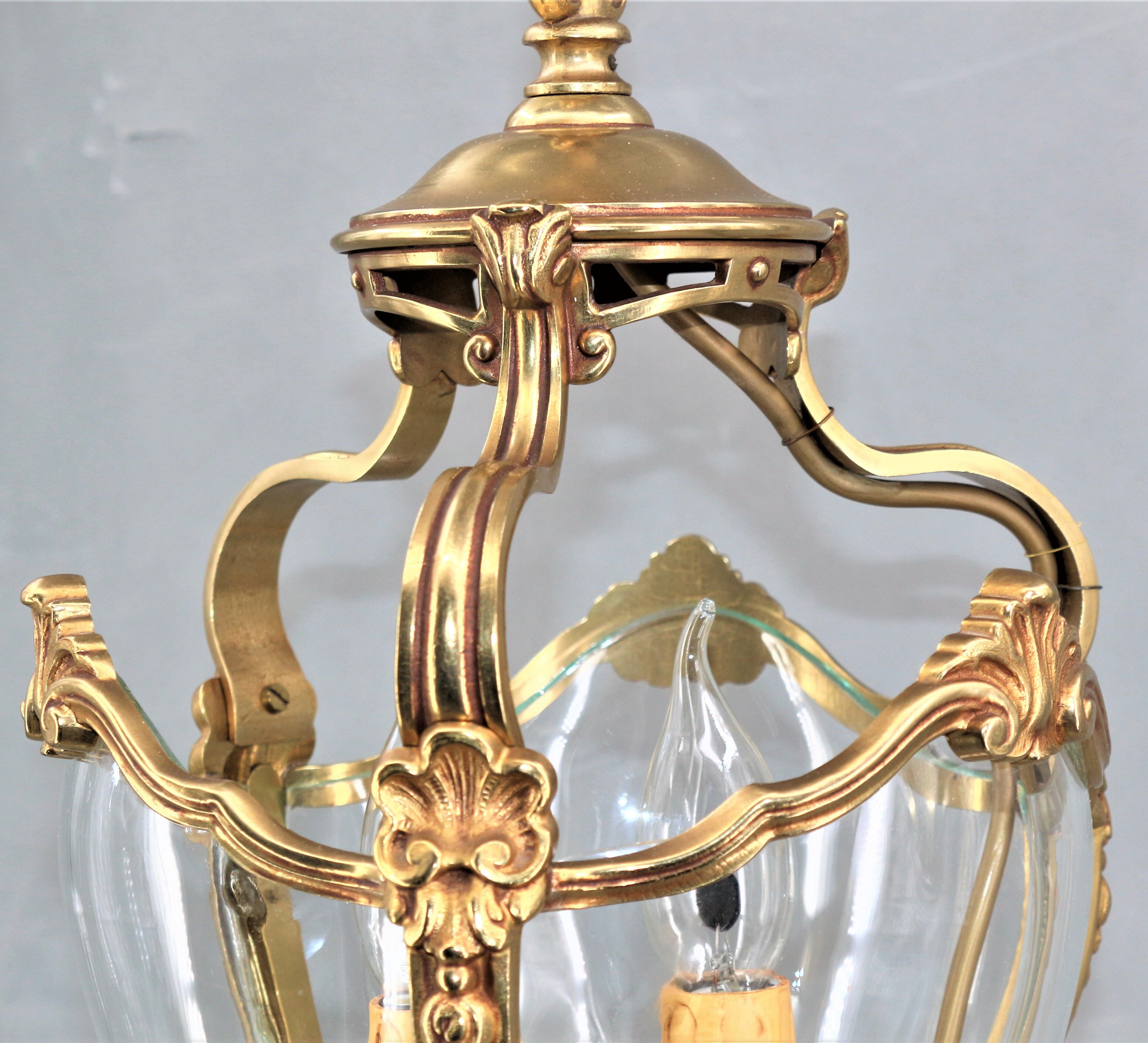 Lustre en bronze et verre bombé