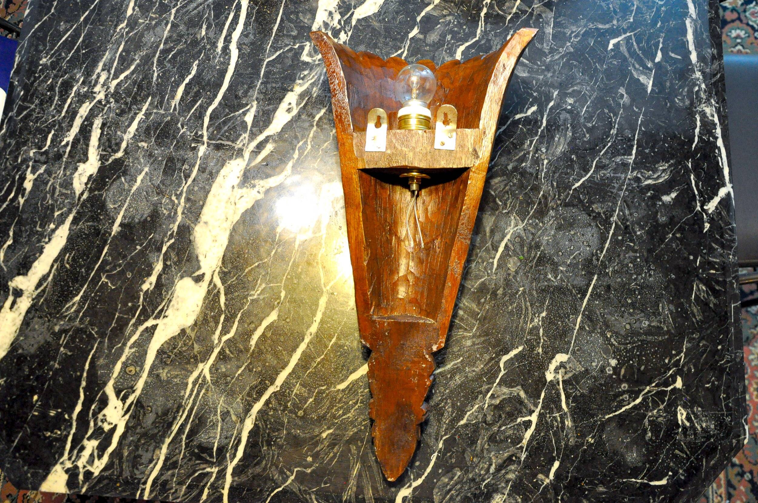 Art Deco wall light in carved wood, France, 1930