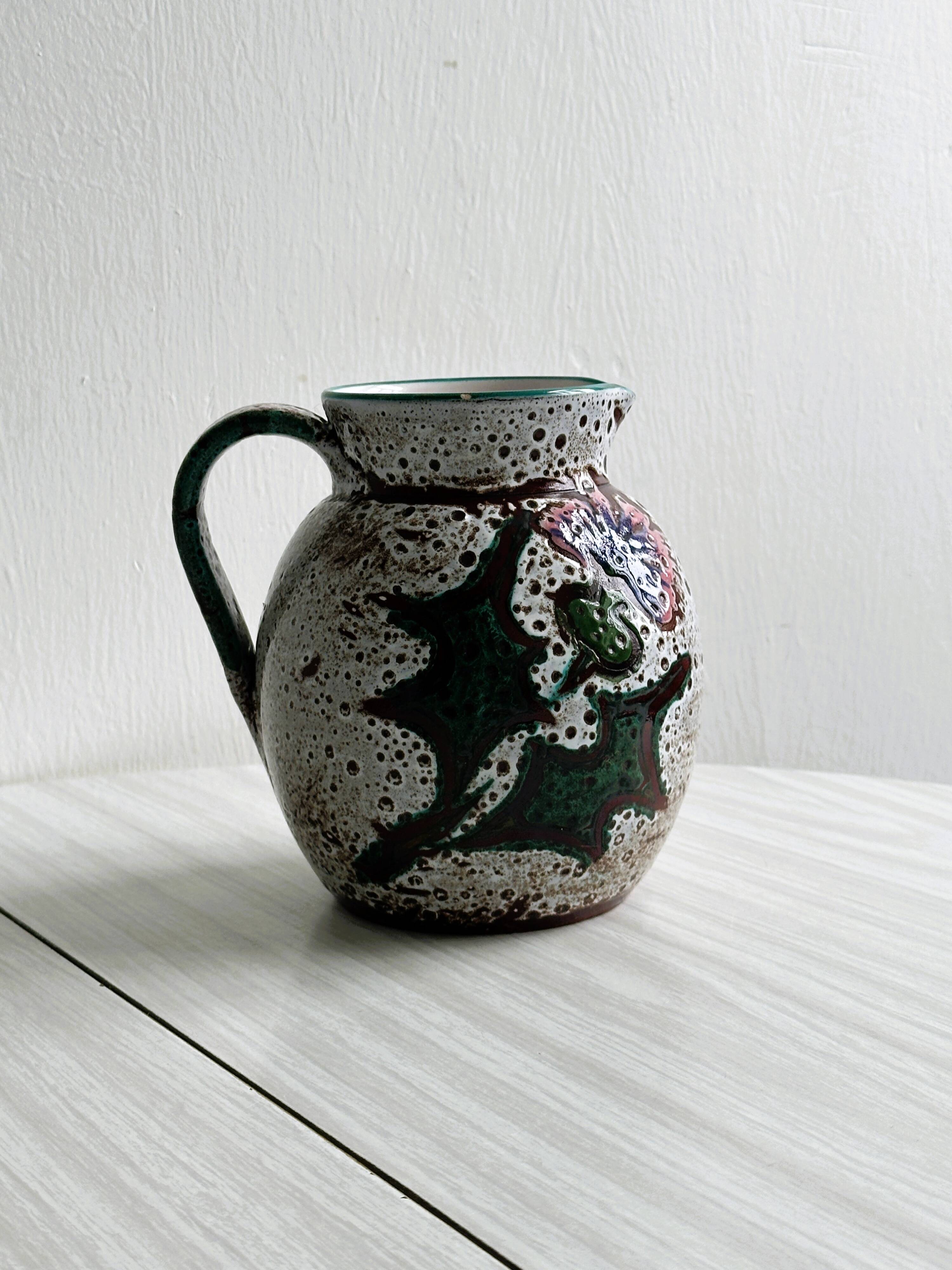 Antique decorative pitcher in French ceramic