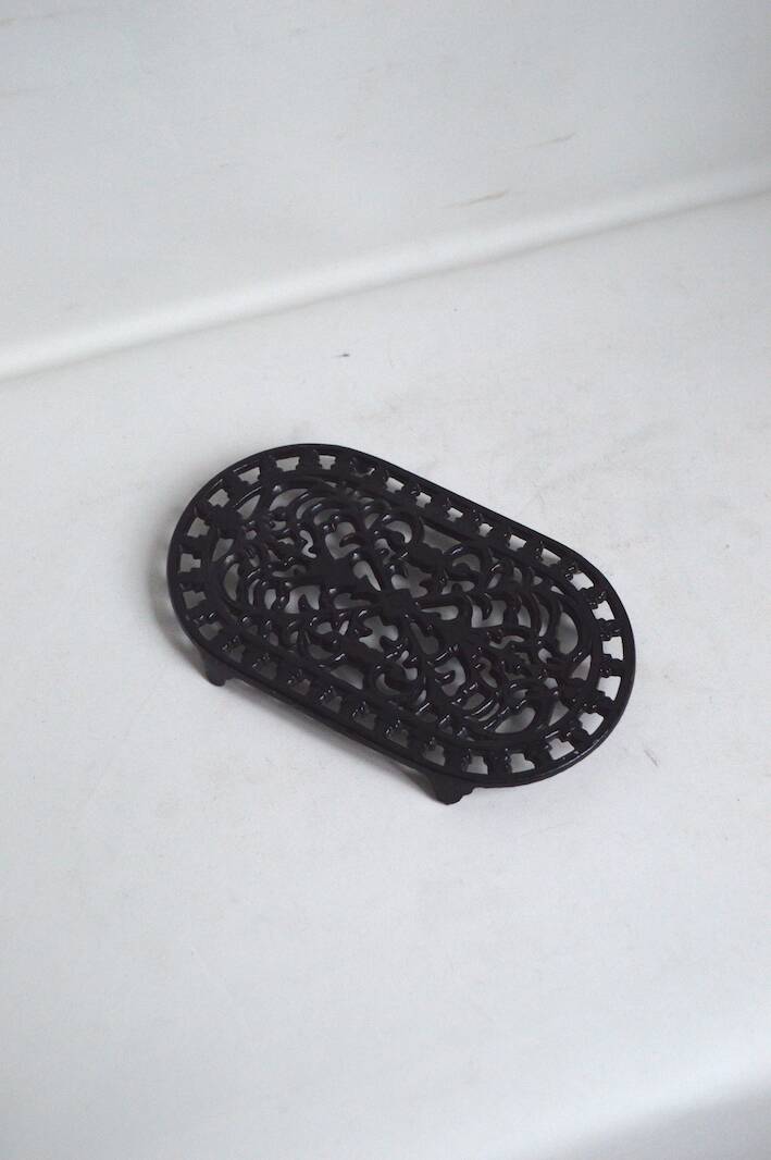 Black cast iron trivet