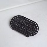 Black cast iron trivet