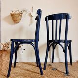 Duo of old blue bistro chairs
