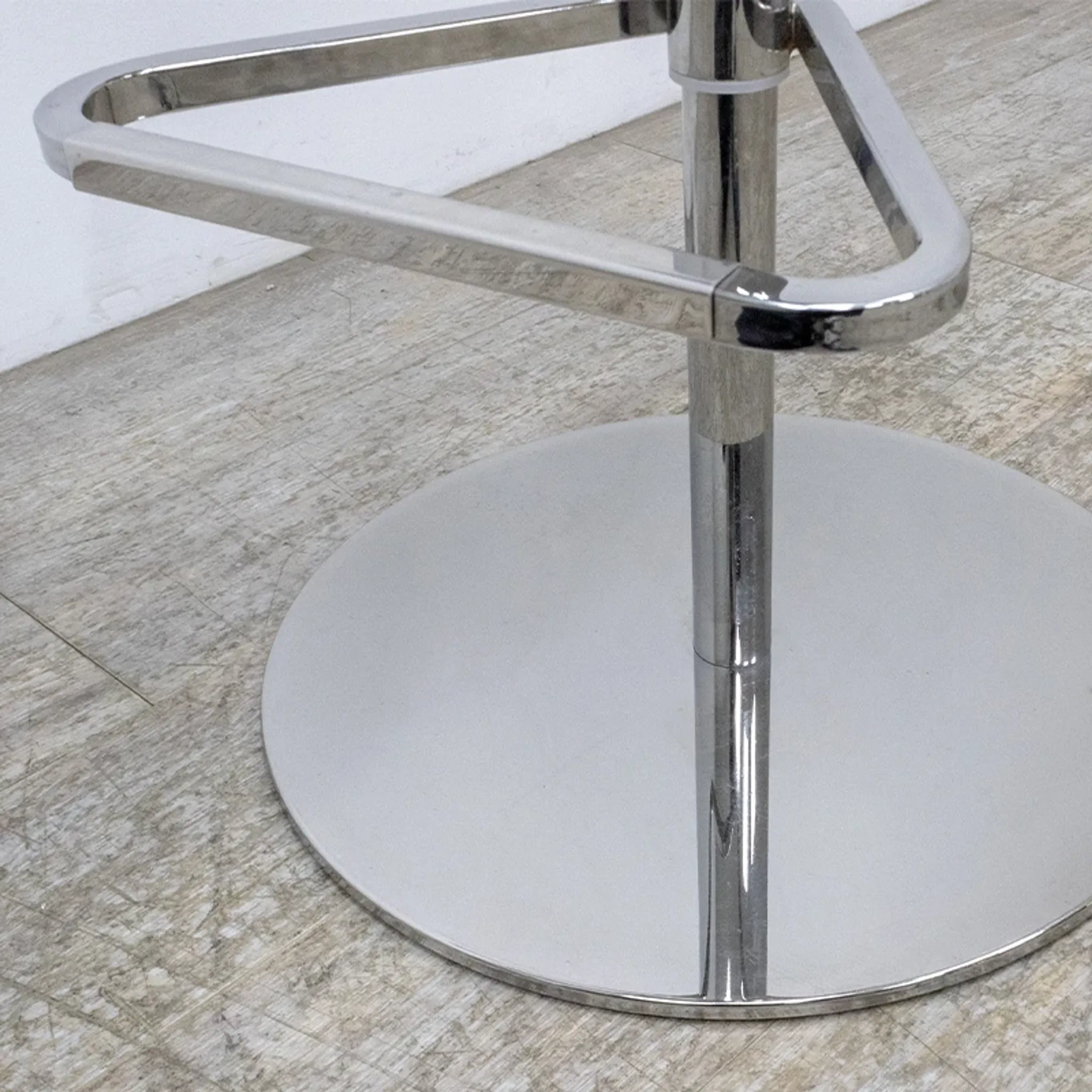 Adjustable orange swivel bar stool