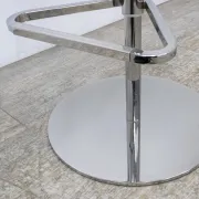 Adjustable orange swivel bar stool