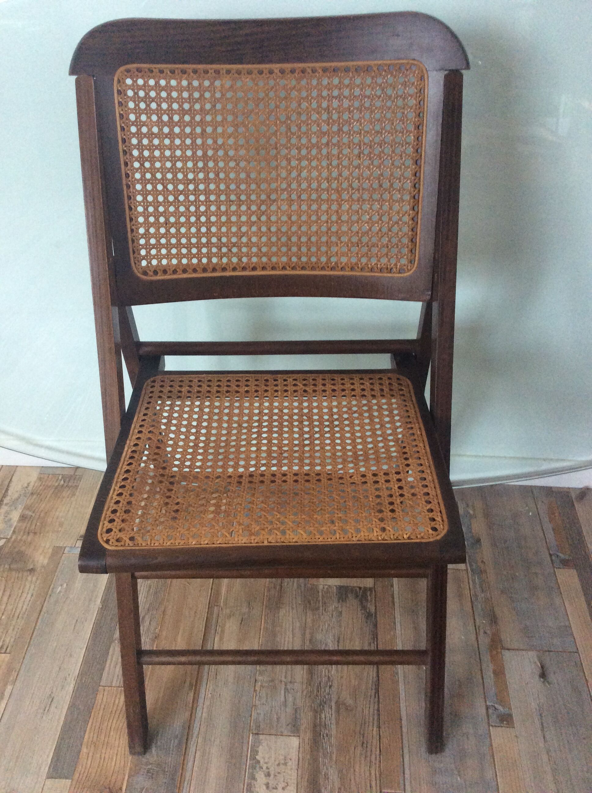 Folding chair caned from the 70s