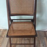 Folding chair caned from the 70s