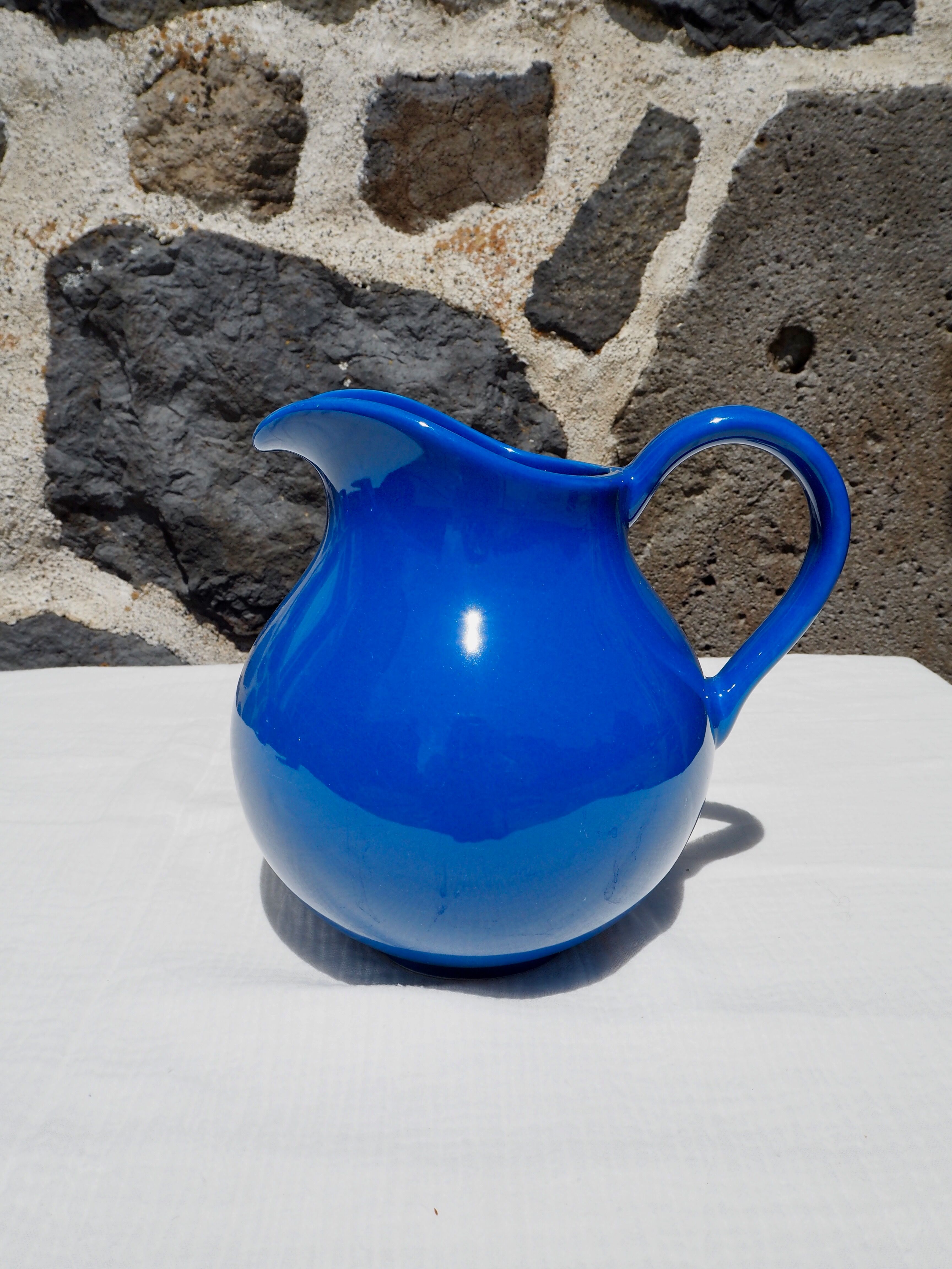 Blue ceramic belly pitcher