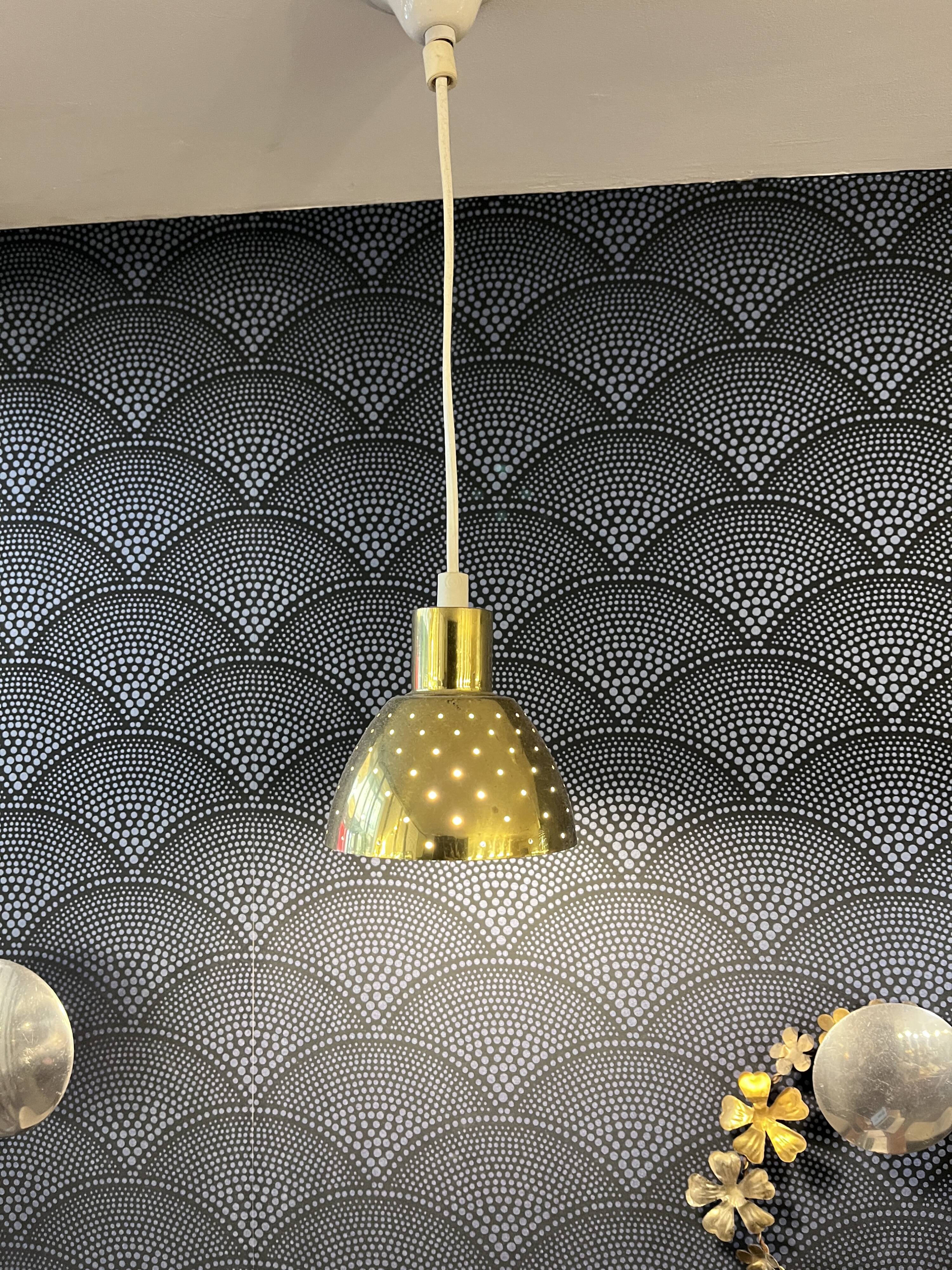 Pair of vintage 1970s gold perforated metal pendant lights. 6 lots.