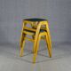 Two MID-Century green vinyl stools from the 1970s with tapered legs.