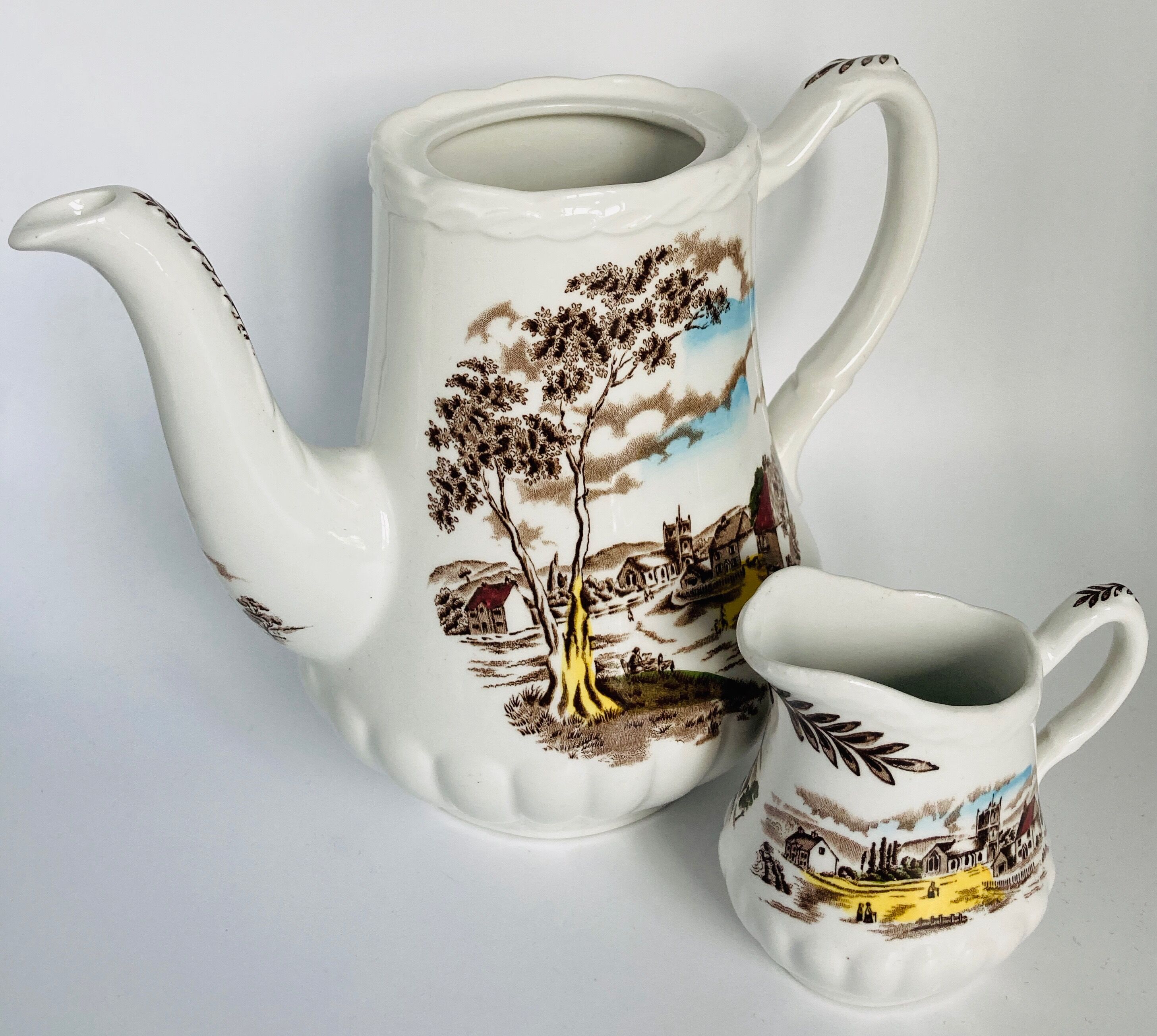 English earthenware cafeteria and its milk pot