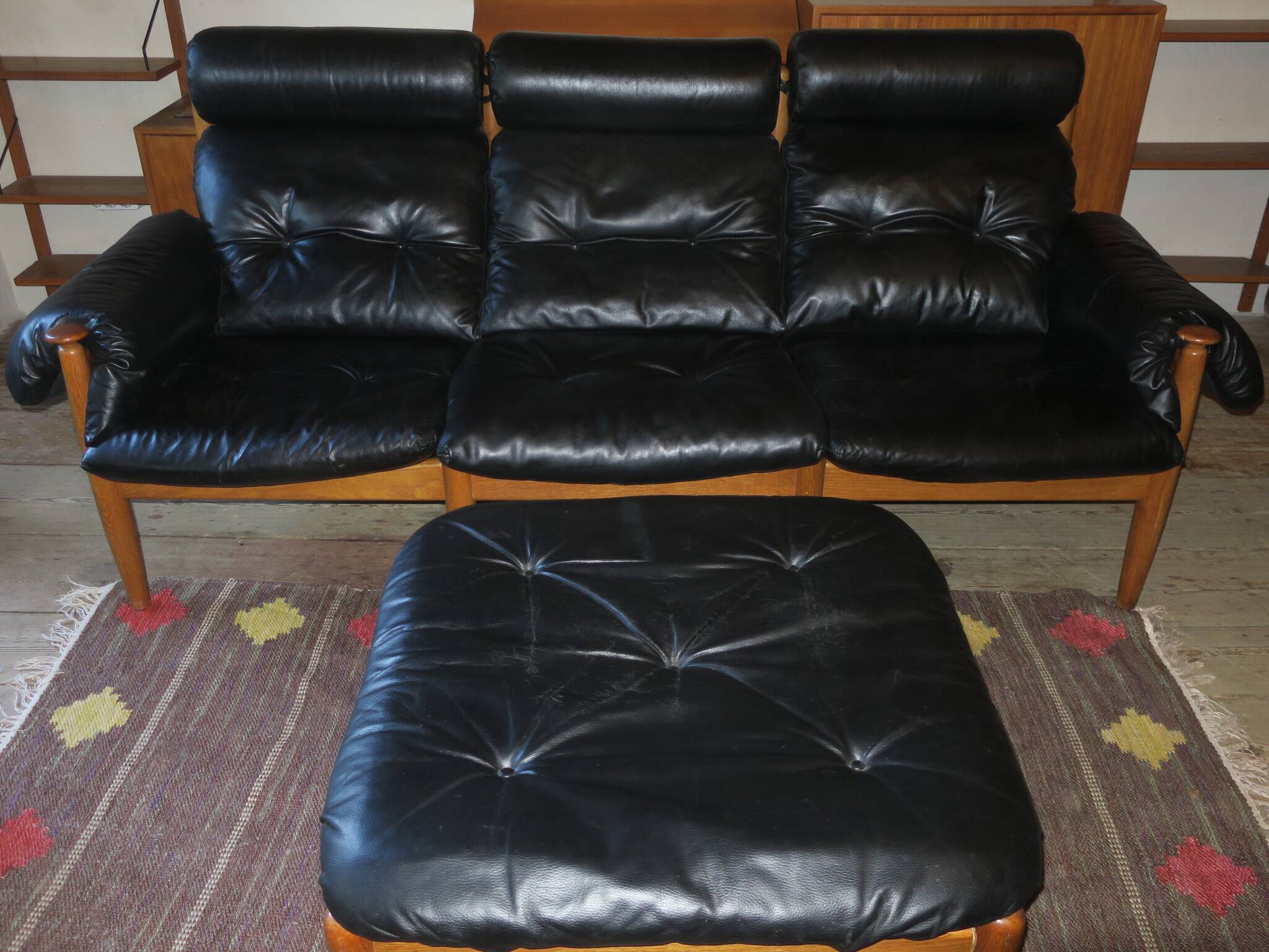 Eric Merthen leather sofa with matching ottoman, Sweden 1960s