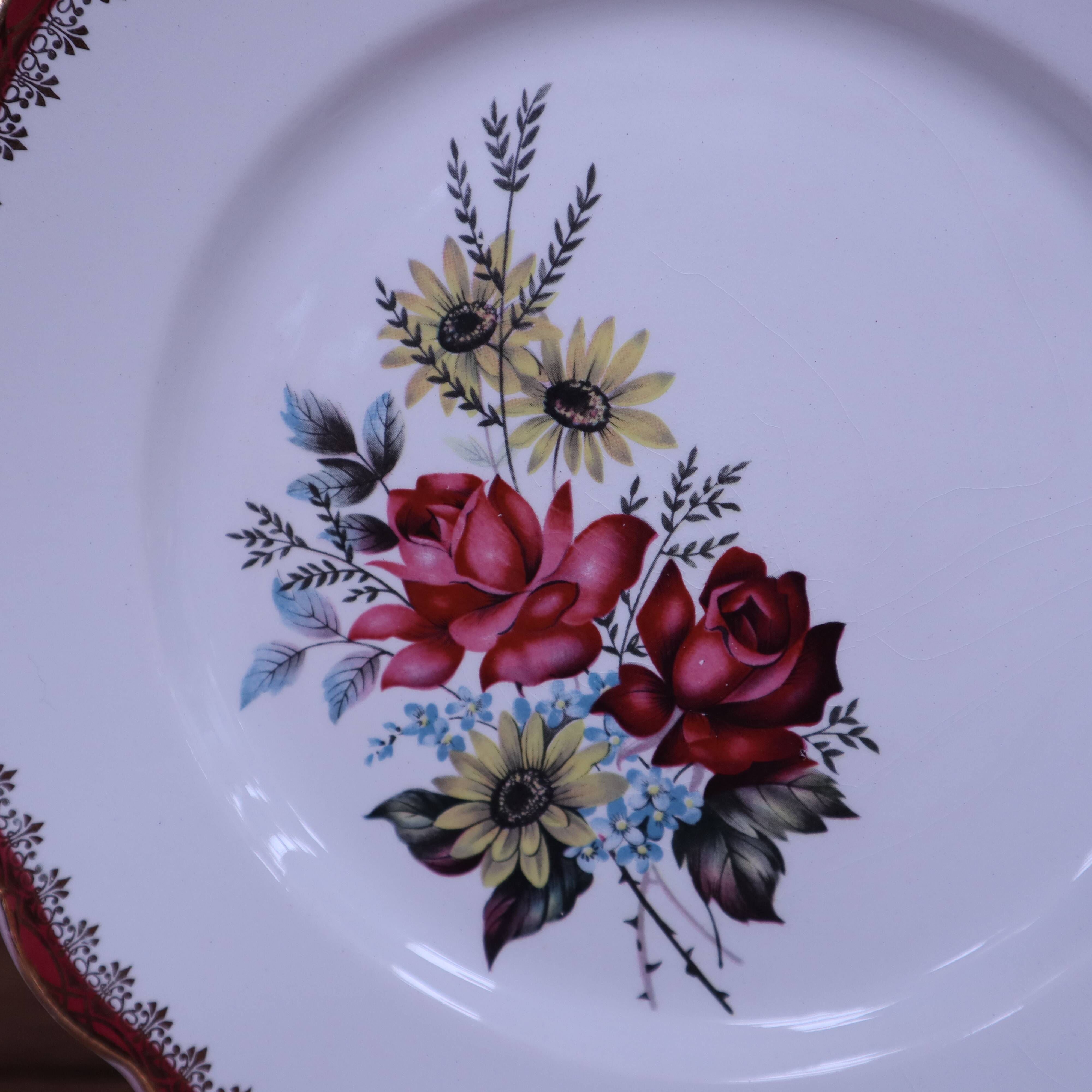 6 flat plates in half porcelain signed FB Floral decoration