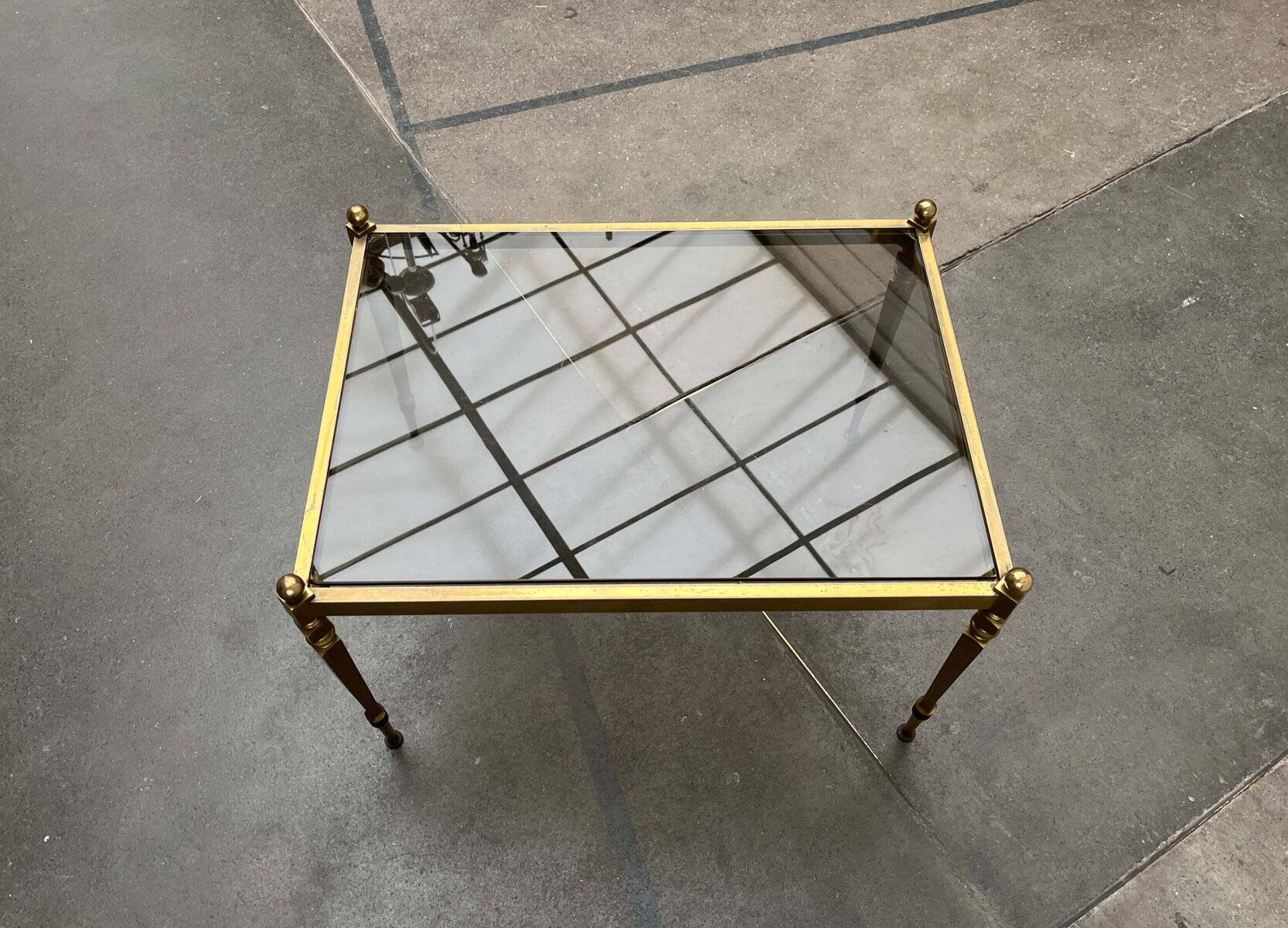Mid-century German Hollywood neoclassical brass and glass side table from the 1950s.