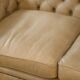 Beige leather Chesterfield sofa handmade in England.