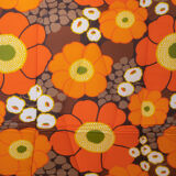 Vintage camp bed with orange flowers