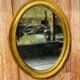 Antique gold oval mirror