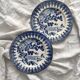 2 ironstone dessert plates with a Japanese-inspired blue design