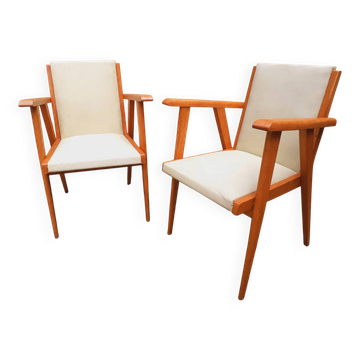 Pair of 1950s armchairs with compass legs.