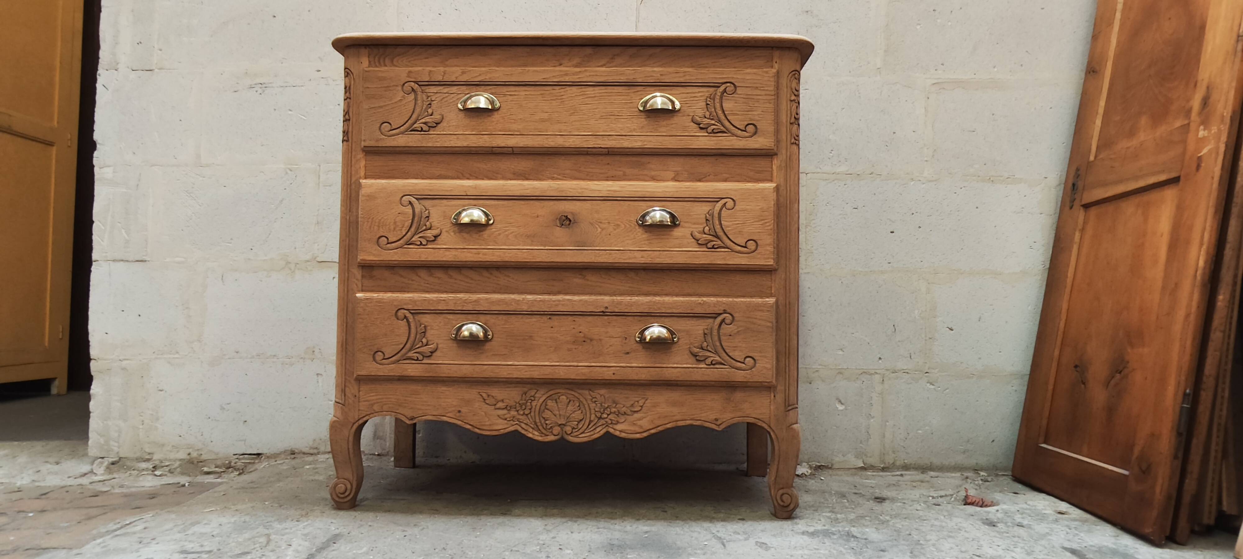 Old chest of drawers with three drawers in raw solid oak