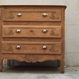 Old chest of drawers with three drawers in raw solid oak