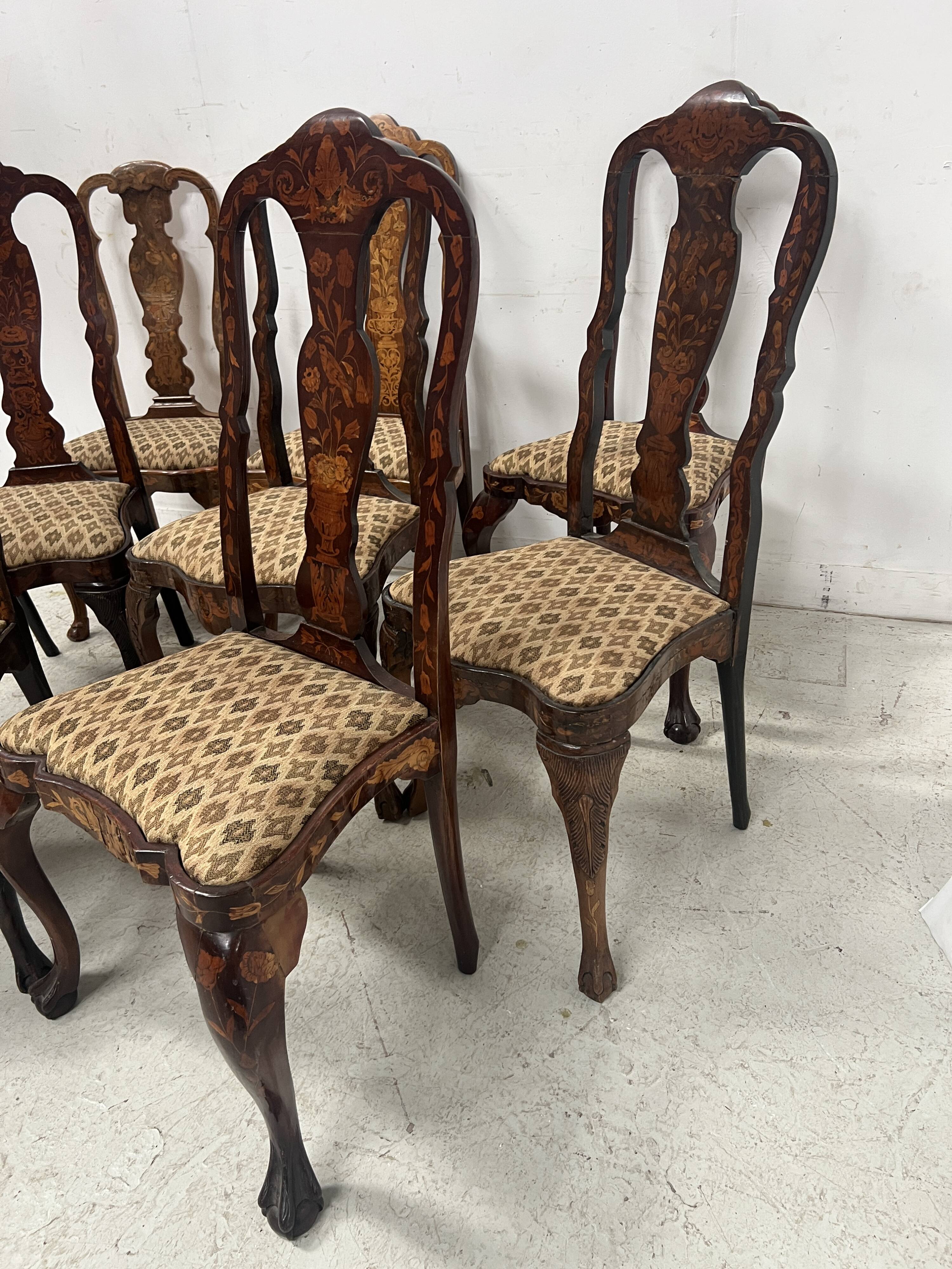 Set of eight Dutch marquetry chairs from the 19th century.