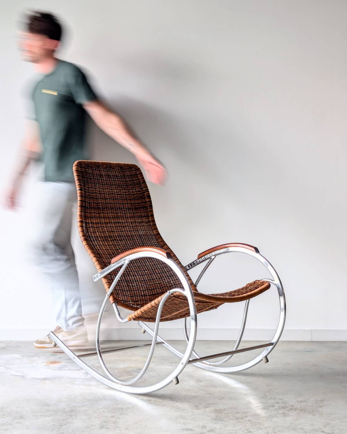 Vintage Thonet rocking chair in chrome and rattan, 1970.