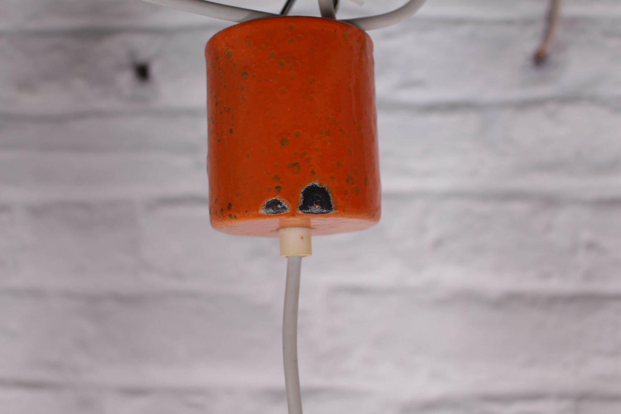 6 Orange enamelled metal suspensions, 1960s