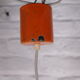 6 Orange enamelled metal suspensions, 1960s